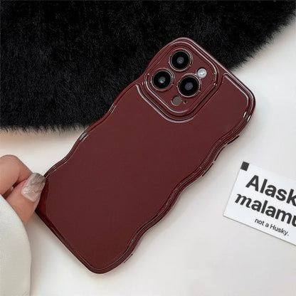Protective iPhone case for women, featuring a stylish sculpted ripple design & shock-absorbent technology.