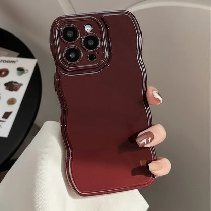 Stylish women's phone cover with a unique sculpted ripple pattern, glossy finish, and shock protection.