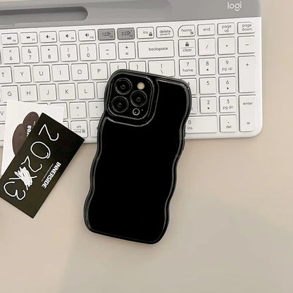 Fashionable women's protective iPhone case, showcasing a sculpted ripple design & high-gloss finish.