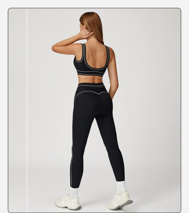 Active women's two-piece set: high-rise sculpting leggings and a matching sports bra for gym.