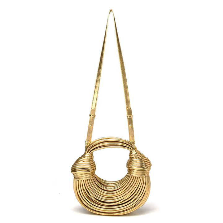 Chic sculptural vegan leather handbag for women. Stylish luxury accessory, perfect statement bag.