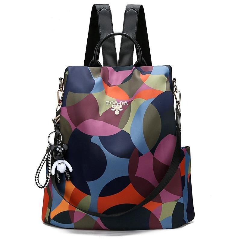 Women's secure anti-theft backpack, water-resistant for travel & daily commute, featuring concealed zippers.