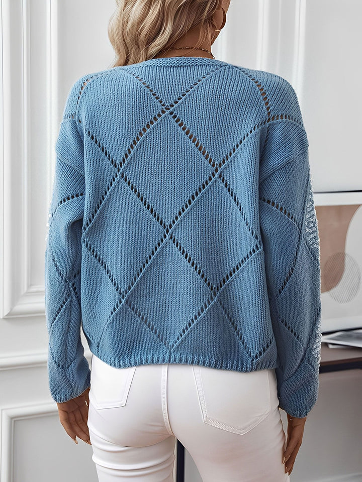 Elegant women's sparkle top featuring a diamond pattern; a comfortable sequin sweater.
