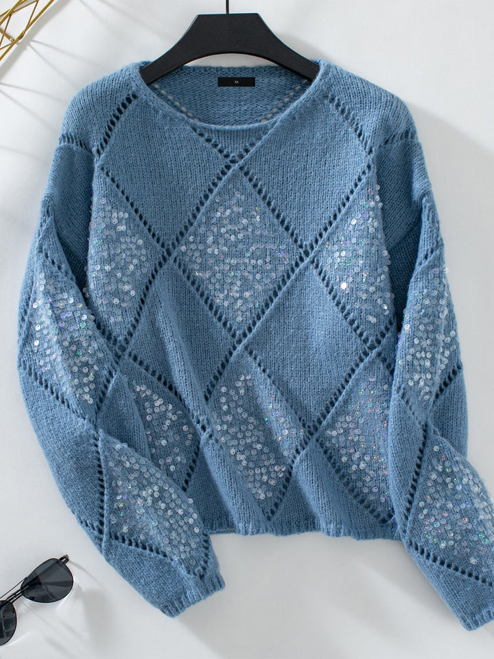 Women's crew neck sparkle sweater, diamond pattern, sequins; a stylish holiday outfit.