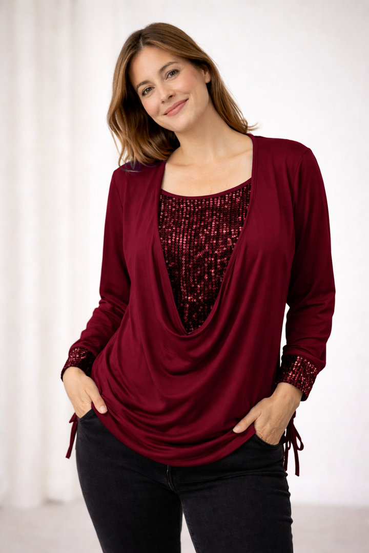 Fashionable sequined blouse for women, with an elegant draped neckline.