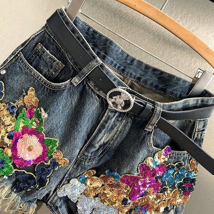 Embellished women's floral shorts with sparkling sequins & handmade details. Unique summer apparel.