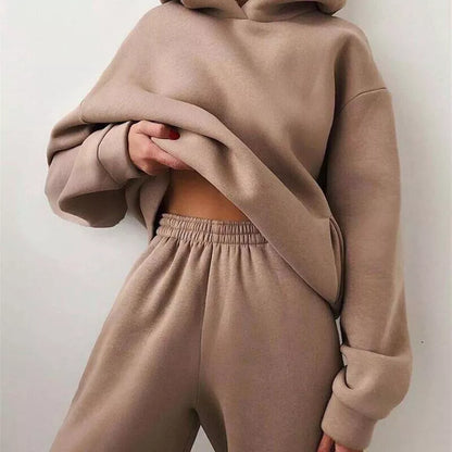 Stylish women's athleisure two-piece set: ultra-soft hoodie & joggers, perfect for casual or active wear.