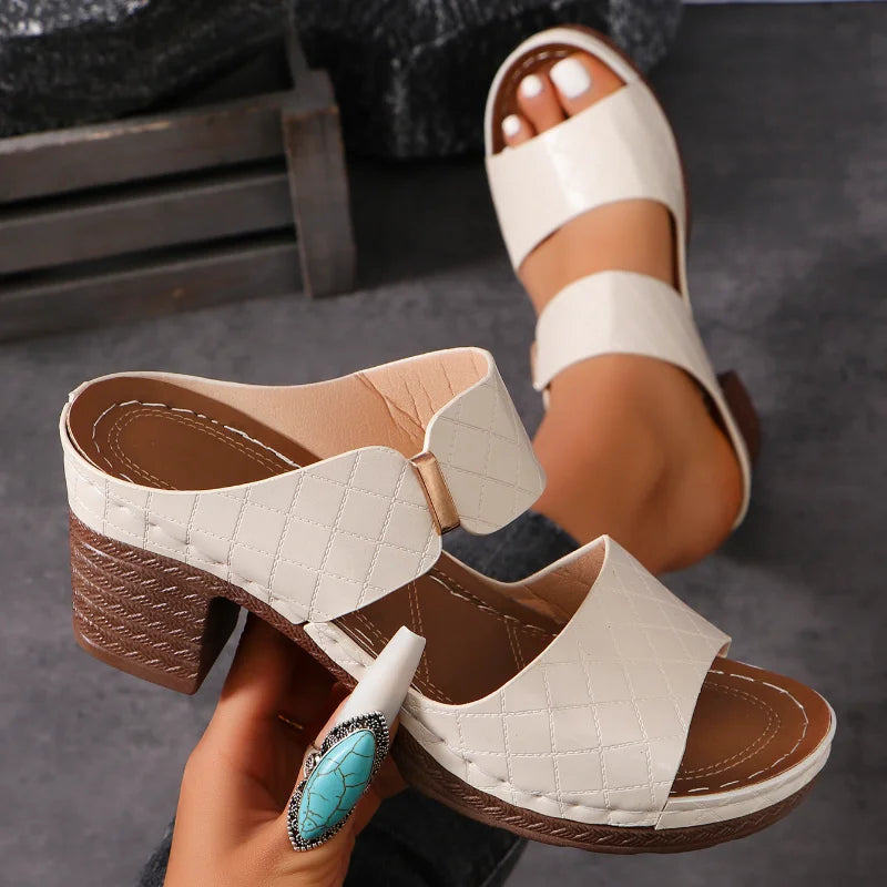 Chic women's Shara block heel leather sandals, elegant design for summer fashion and everyday wear.