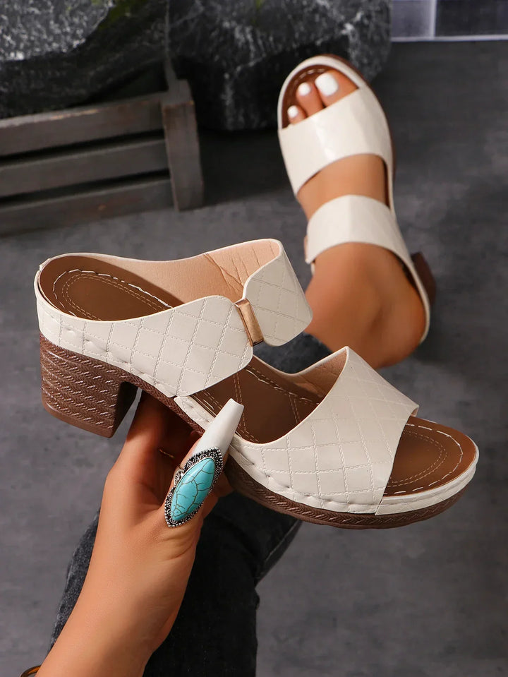 Stylish Shara women's block heel leather sandals, comfortable & chic for versatile everyday fashion.