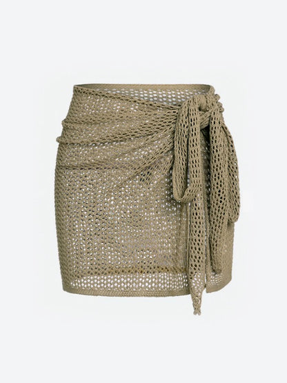Women's sheer knit beach cover-up skirt for swimwear, ideal for vacation & resort wear.