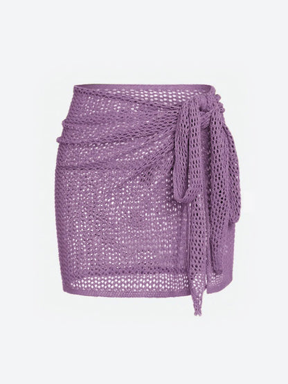 Lightweight women's sheer knit beach cover-up skirt, essential for swimwear & summer fashion.