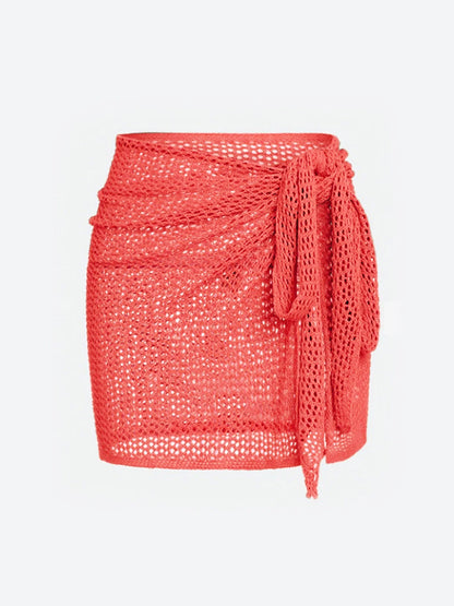 Versatile women's sheer knit beach cover-up skirt, adjustable, ideal for swimwear, resort & summer.