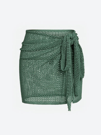 Elegant women's sheer knit beach cover-up skirt with high slit, adjustable for perfect summer style.