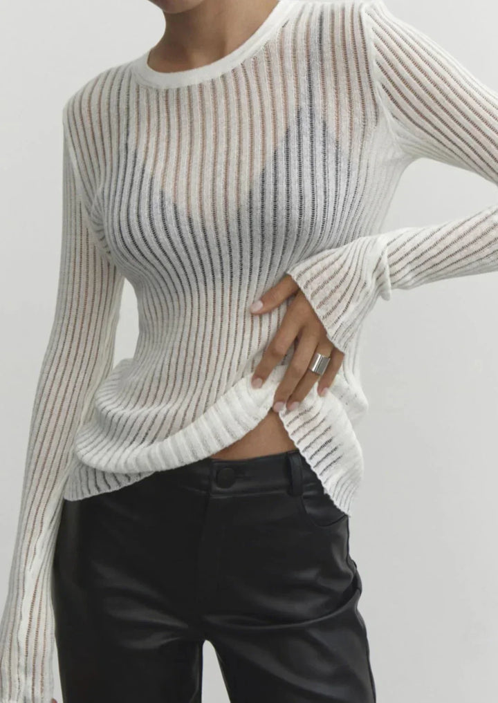 Fitted sheer ribbed long sleeve top for women, chic and modern, perfect for layering.