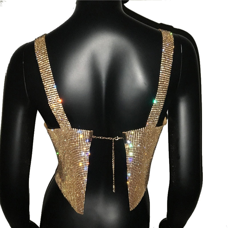 Eye-catching women's clubwear top, a shimmering bling crop top for dazzling party fashion.
