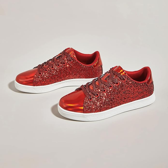 Front view of women's shimmering, lace-up sneakers; chic, trendy footwear.