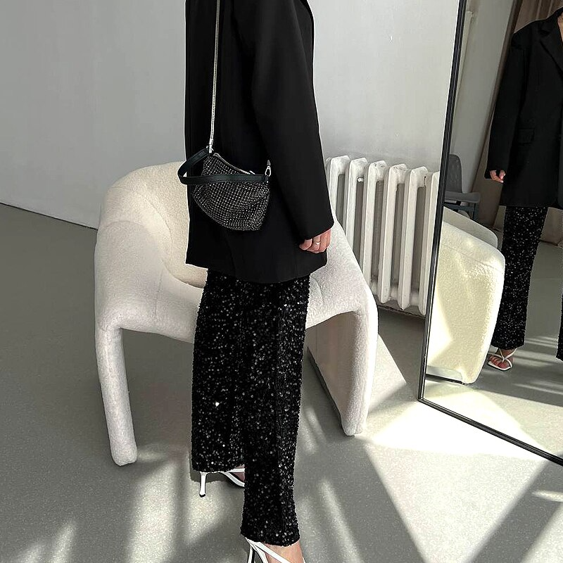 Versatile women's shimmering party pants, a statement piece for festivals or a stylish night out.