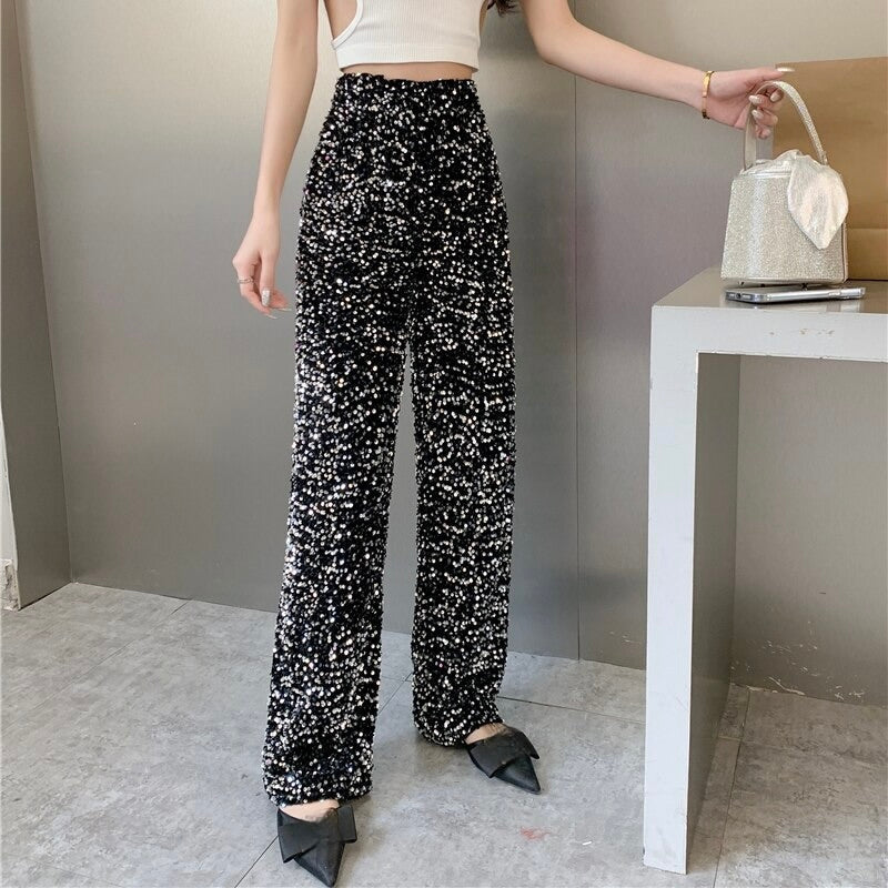 Shimmering disco pants for women, perfect festival wear. One-size, comfortable, and eye-catching.