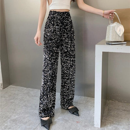 Shimmering disco pants for women, perfect festival wear. One-size, comfortable, and eye-catching.