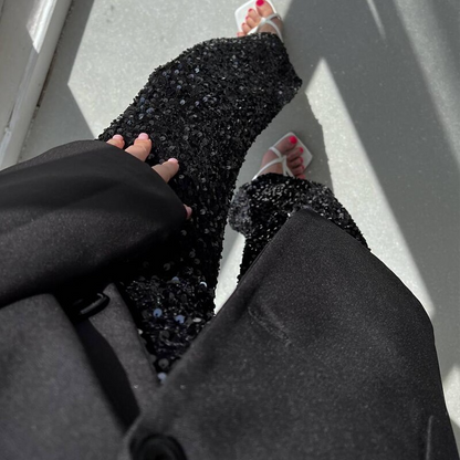 Comfortable and stylish women's shimmering party pants, a glamorous statement piece for your next event.