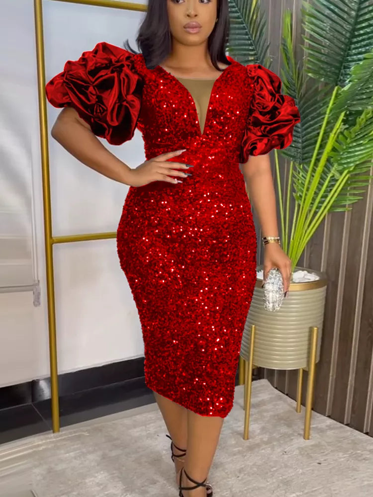 Women's shimmering plus-size dress with elegant puff sleeves, perfect for festive glamour and evening wear.