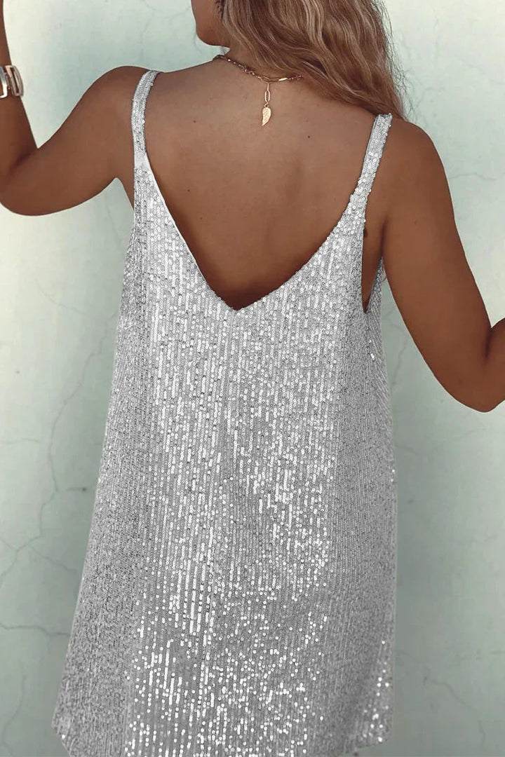 Fashionable women's sequin mini party dress, a shimmering V-neck design for evenings.