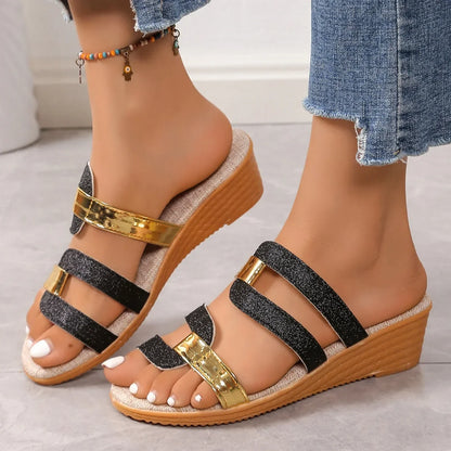 Strappy shimmering women's sandals with a comfortable triple-strap design, summer-ready.