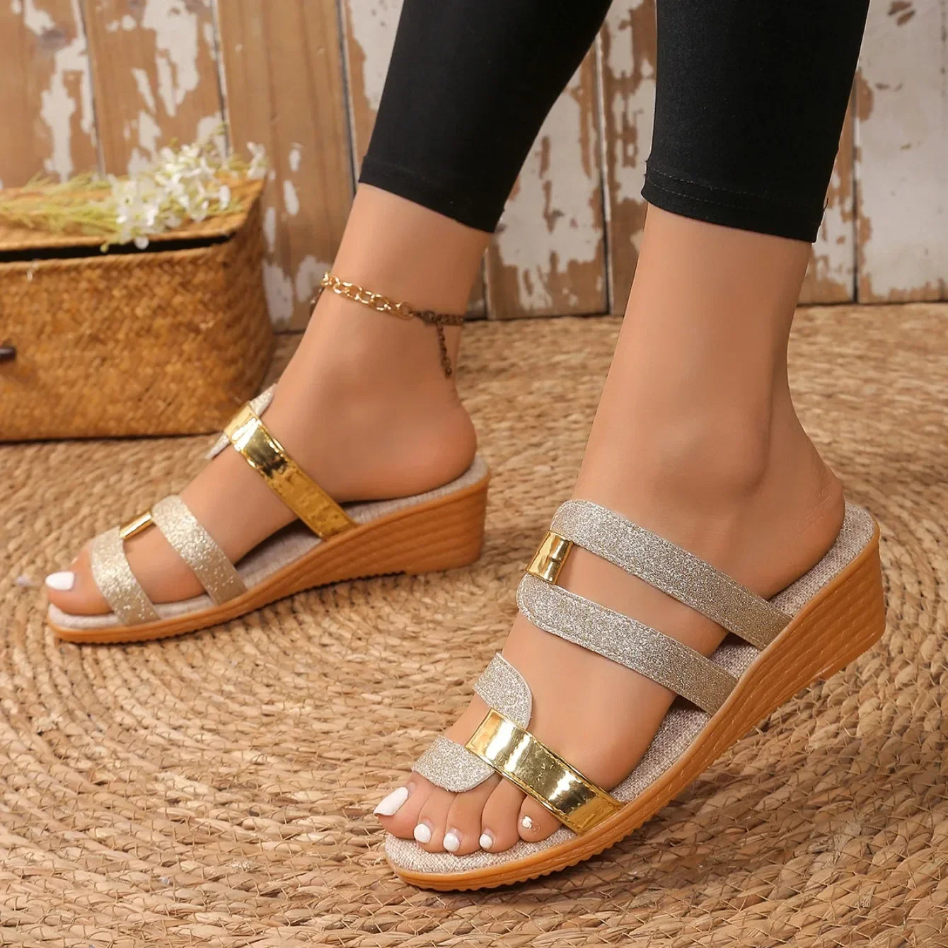 Close-up: Women's glittering triple-strap sandals, showcasing shimmery details for summer fashion.