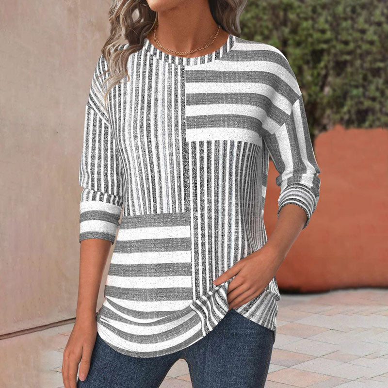 Women's short sleeve striped blouse, perfect for casual everyday wear. Comfortable spring/summer fashion top.