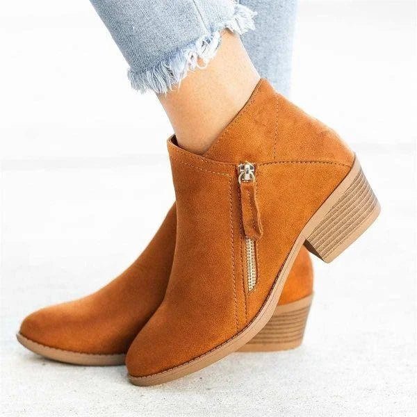 Comfortable women's casual ankle boots featuring a practical side zip and stable block heel design.