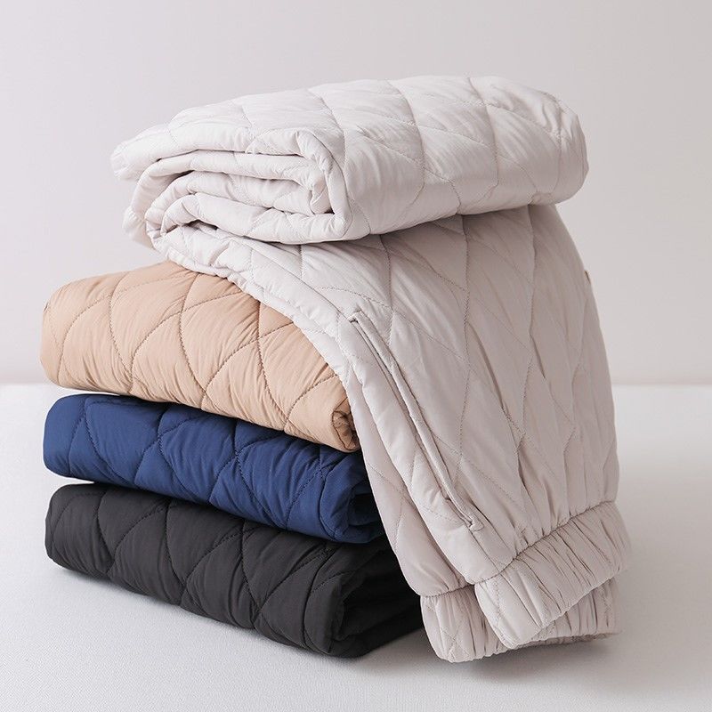 Full view of women's Sierra quilted pants, combining cozy comfort, relaxed fit, and chic diamond stitch design.