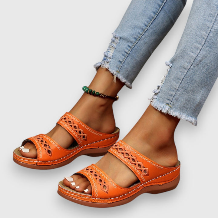 Women's Sierra wide fit open-toe sandals. Lightweight, comfortable slip-on design for casual summer wear.