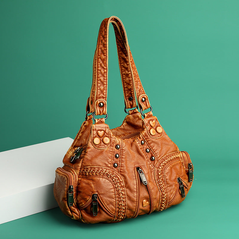 Women's elegant faux leather shoulder bag. A stylish and versatile handbag for modern women.
