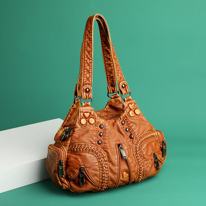 Women's elegant faux leather shoulder bag. A stylish and versatile handbag for modern women.