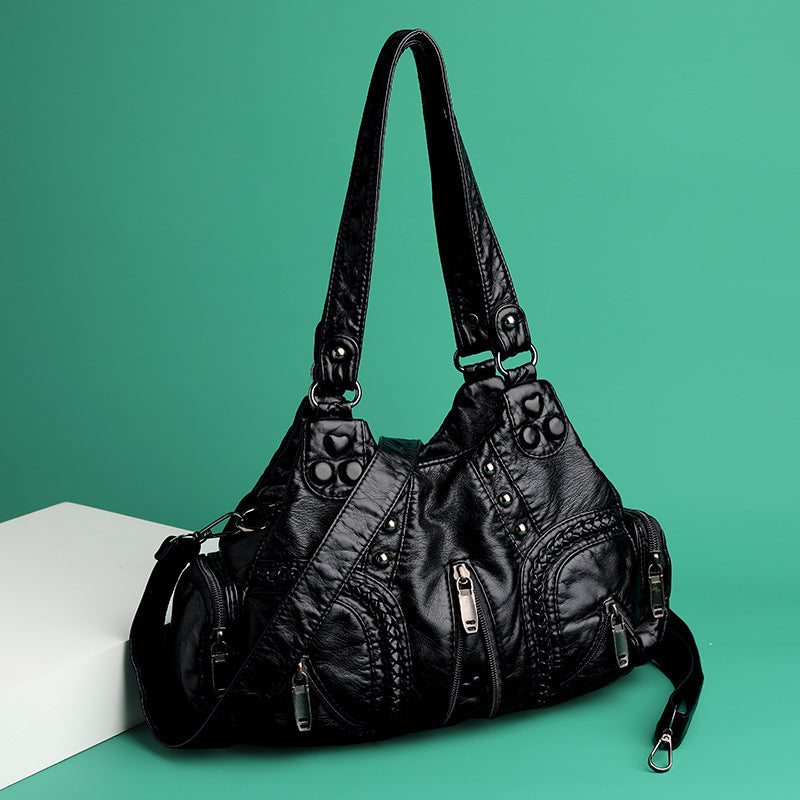 Versatile women's faux leather crossbody bag. A chic fashion accessory and everyday purse.