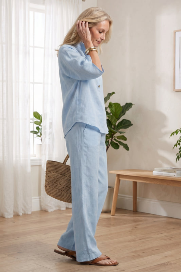 Beige women's comfort wear two-piece set, relaxed fit matching outfit for casual summer style.