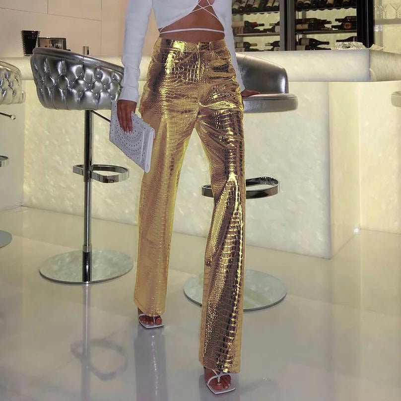 Dazzling gold women's sleek designer style pants. Chic evening wear or party pants for a stunning look.