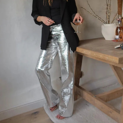 Women's designer style sleek pants, tailored for a modern silhouette. Chic fashion versatile bottoms.