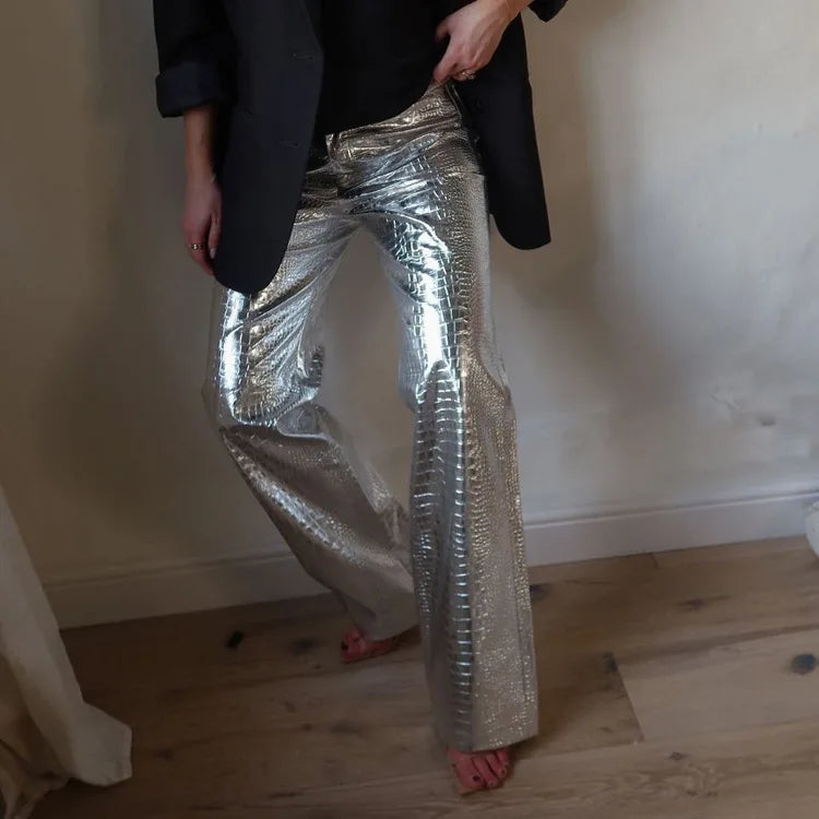Elegant women's sleek designer style pants. Perfect evening wear trousers for a sophisticated party look.