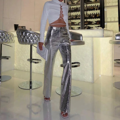 Stylish women's sleek designer style party pants. Modern trousers for a chic, fashion-forward look.