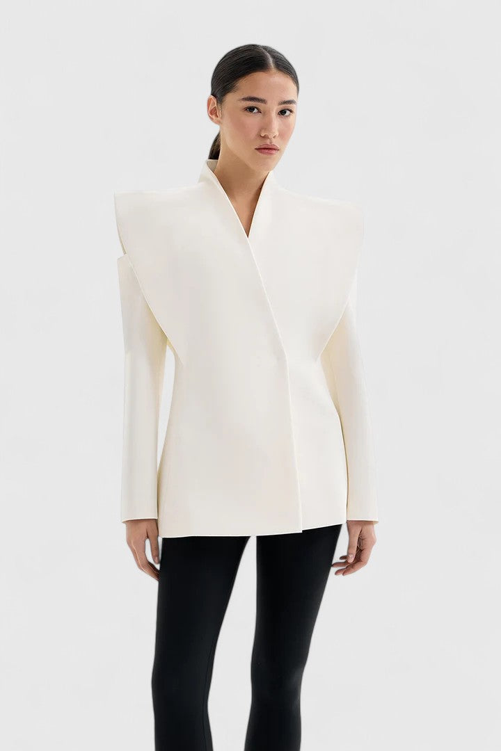 Women's sleek ivory tailored blazer with structured shoulders, perfect for office workwear.