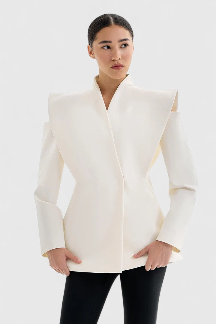 Sleek women's tailored ivory blazer, structured shoulders, offering a sharp, professional look.