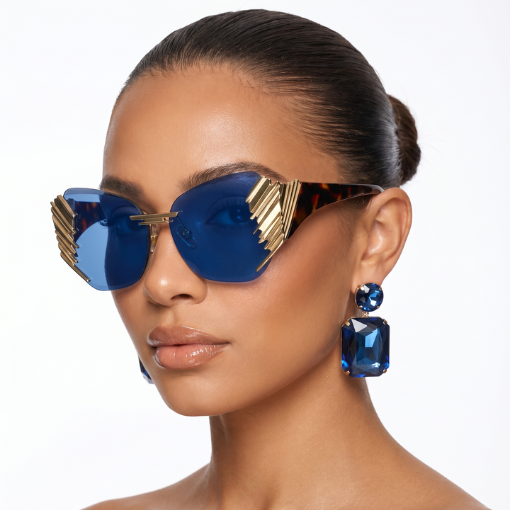 Lightweight women's mirrored gradient sunglasses with anti-reflective lenses, offering sleek summer style.