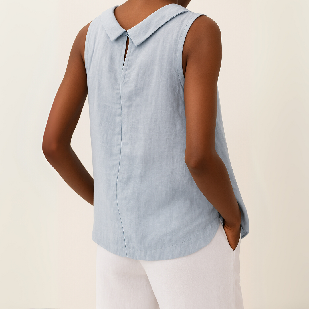 Relaxed fit women's sleeveless summer blouse, a comfy round neck top for casual fashion.