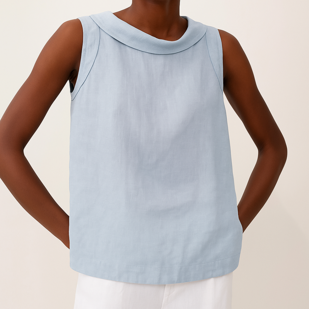 Women's sleeveless casual blouse, round neck top for summer everyday fashion.