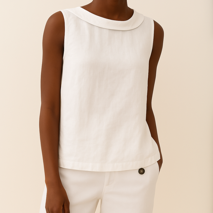 Stylish women's sleeveless blouse with a round neck, great for chic casual summer outfits.