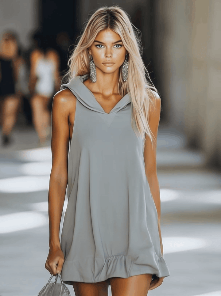 Comfortable women's A-line sleeveless mini dress, hooded with a swing ruffle hem for relaxed summer days.