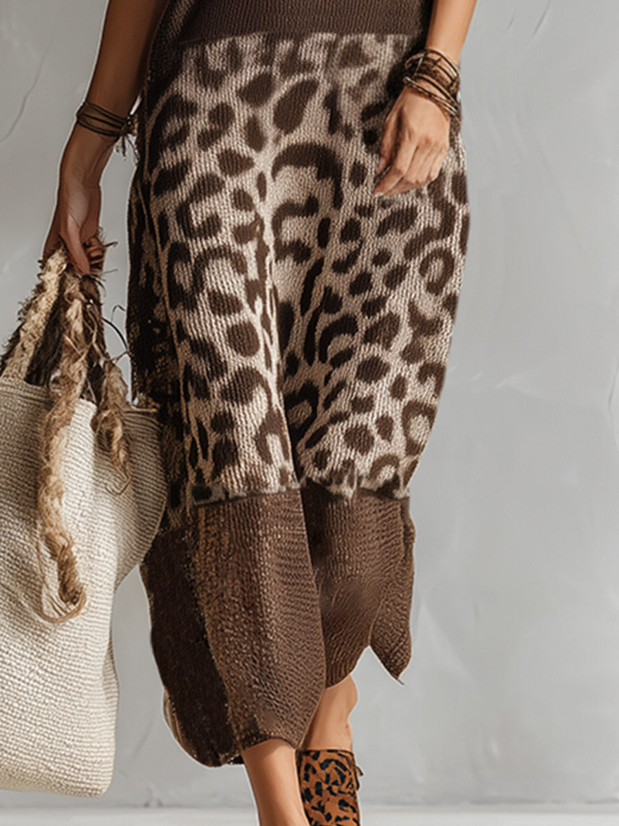 Chic women's sleeveless midi dress with a bold leopard print, great for casual outings or parties.