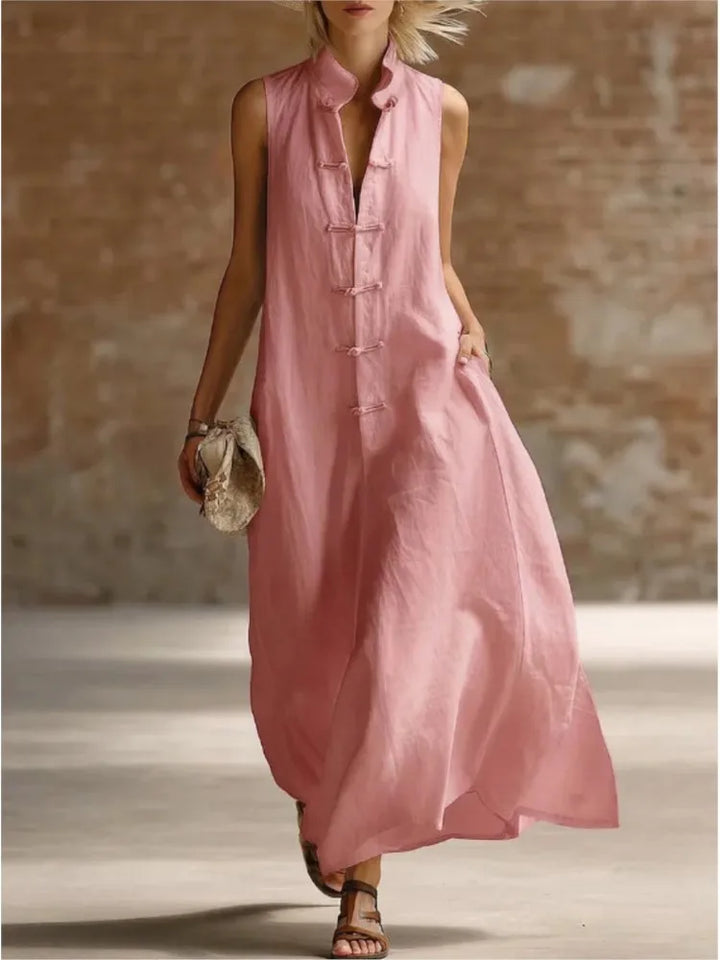 Elegant women's sleeveless maxi dress. Relaxed fit shirt dress, ideal for vacation or beach.