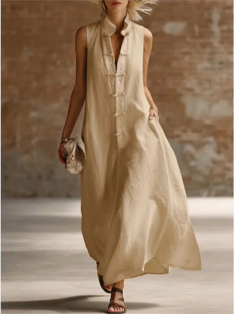 Relaxed fit sleeveless maxi shirt dress for women. Effortless elegance, perfect for beach outfits.